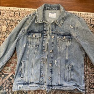 Distressed denim jacket